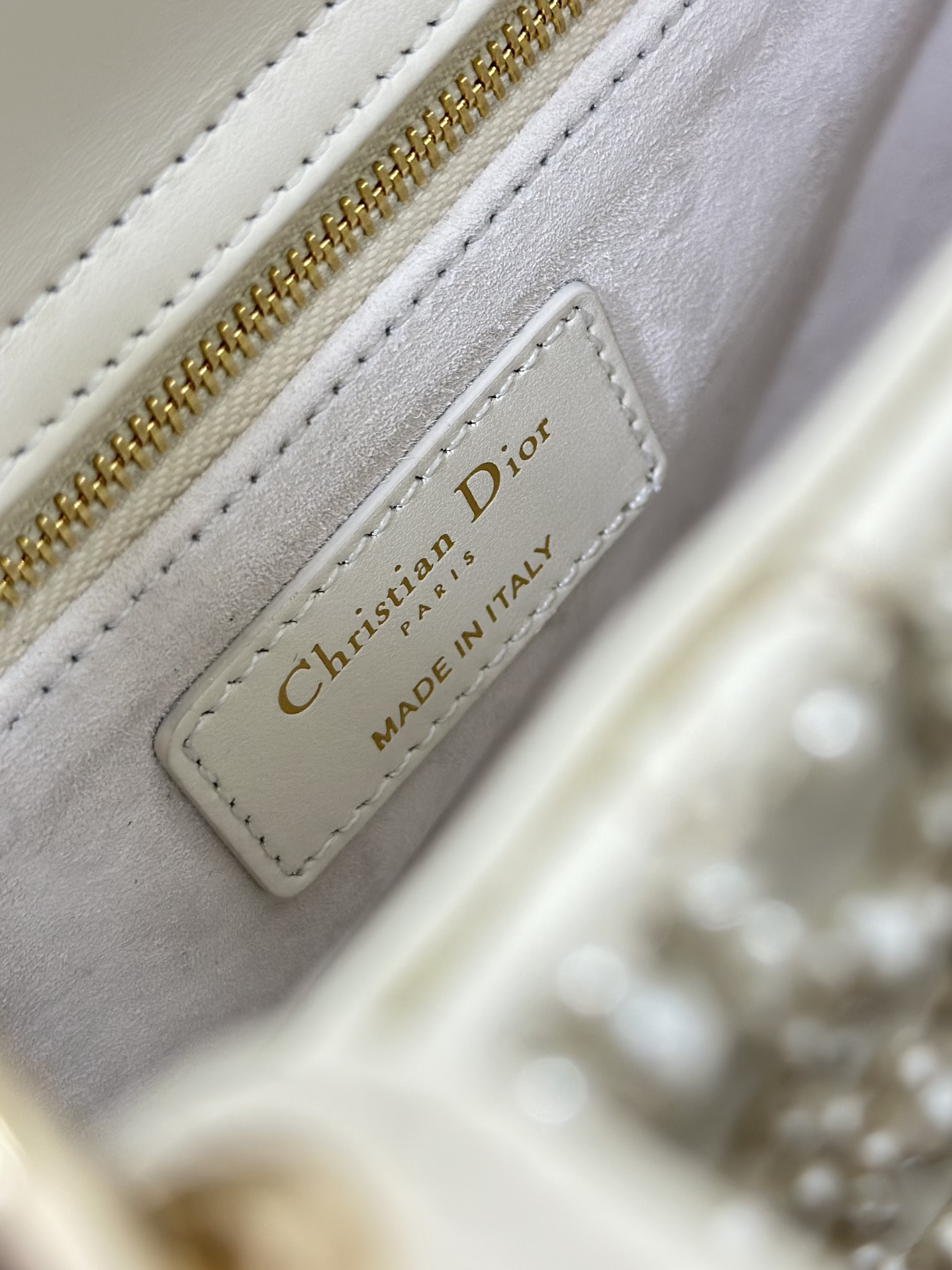 Lady Dior embroidered half a pearl in four squares with imported lamb tendons inside The handb