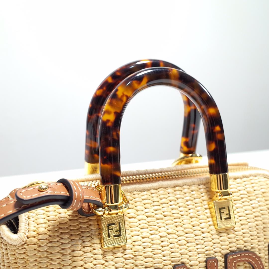 FENDI iconic By The Way Mini Boston handbag made of natural grass woven material showcasing mo