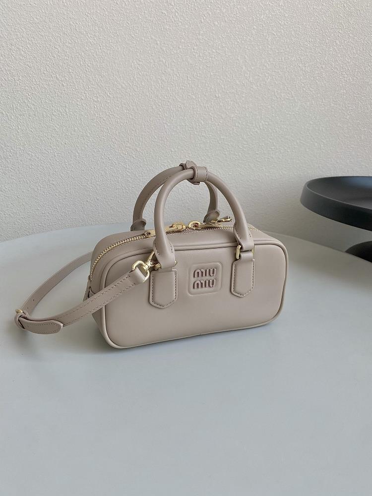 The Miu Miu Bowling Bag in Milk Tea color is undoubtedly a big hit in the fashion world a