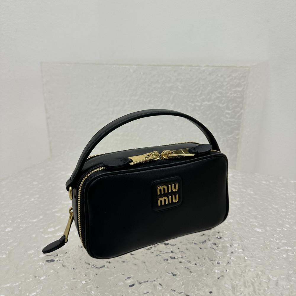 What sets the Miumiu lunch box bag apart from other designer handbags is its modern interp