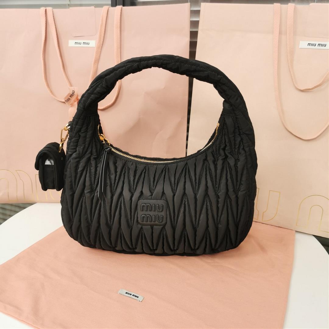 MiuWander handbag a new product of M family is made of environmentfriendly nylon The yarn is made of