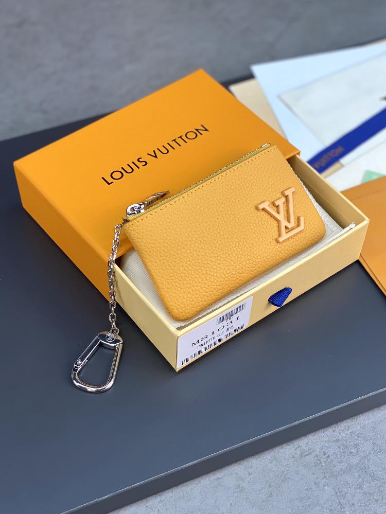 the m81031 yellow key coin purse is elegant and small with small leather bags which can be used fo