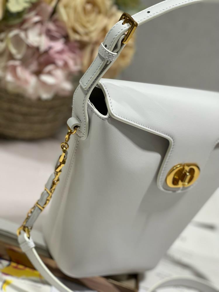 The sleek silhouette of the Montaigne Mini Chain Bucket Bag effortlessly marries style and