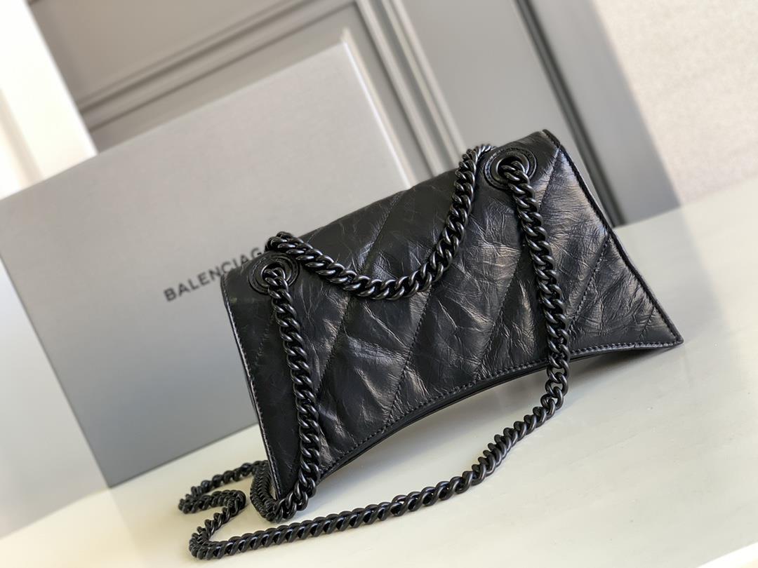 Small black twill small Crush Quilted Chain BagThe hourglass bag shape is really amazingThis t