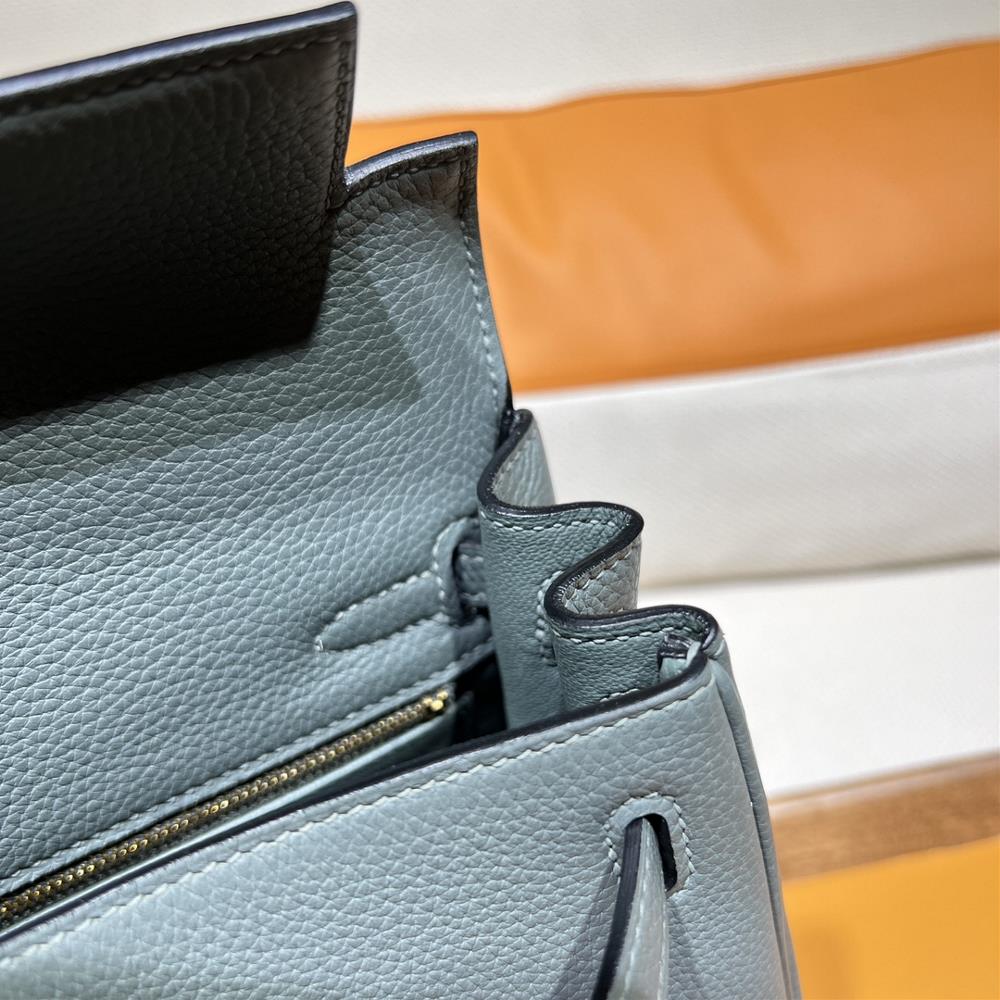 Investing in a Hermes Bag Kelly 25 Togo 63 in Almond Green is not just about owning a fa