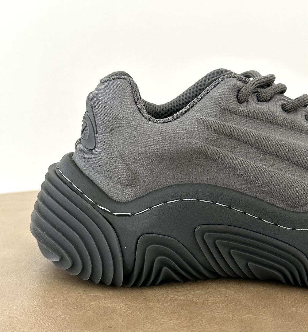 Grey Aw Vortex Shoe Size 3536373839 This sports shoe is designed with a unique pattern to crea