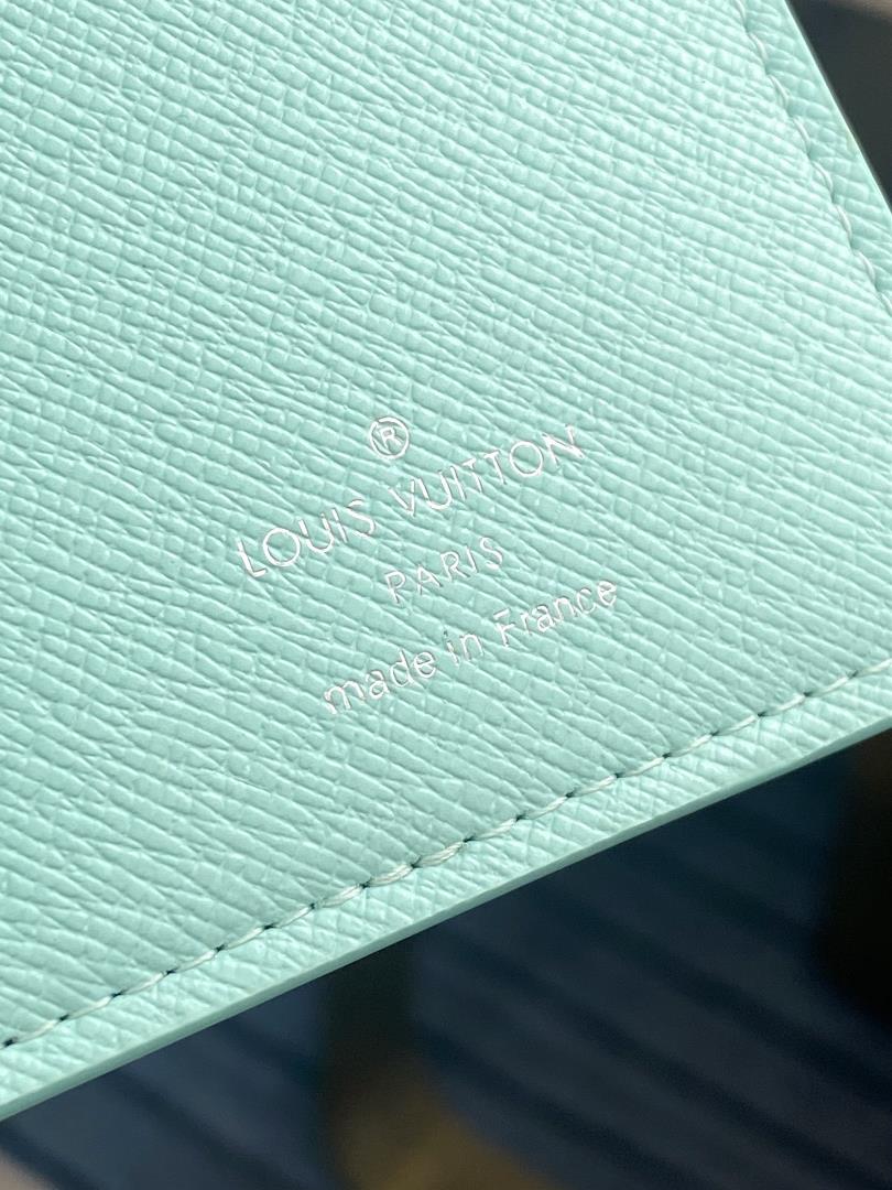 lv M82306 light green long clip this Brazza wallet is crafted with Monogram Aquagarden c