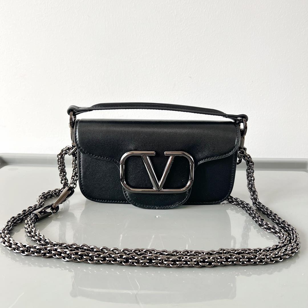 Garavani MINI LOC calfskin handbag with metal VLogo Signature detailsEquipped with detacha