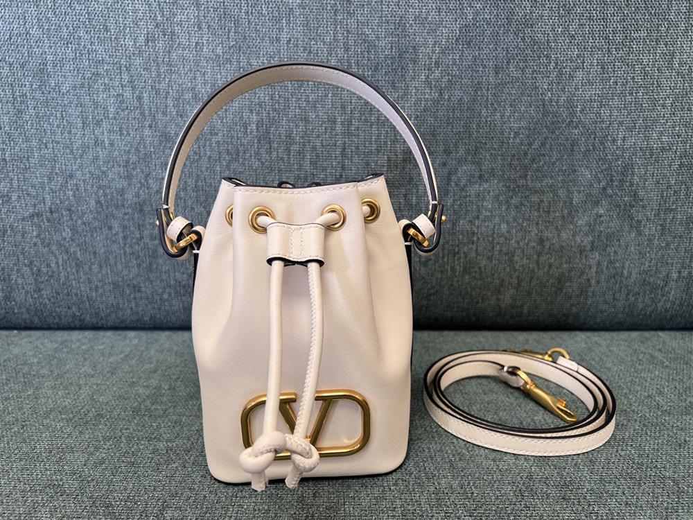 VALENTINO GARAVANIVLOGO SIGNATURE Soft Sheepskin Mini Bucket Bag Thanks to the design of detachable