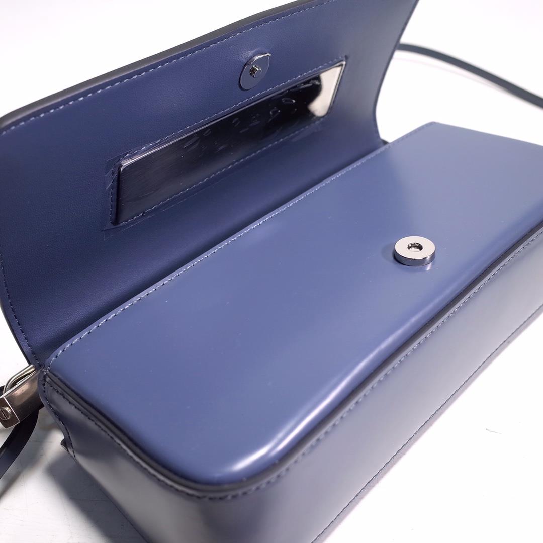 The FENDI handheld bag is made of blue brushed leather material decorated with large F metal a