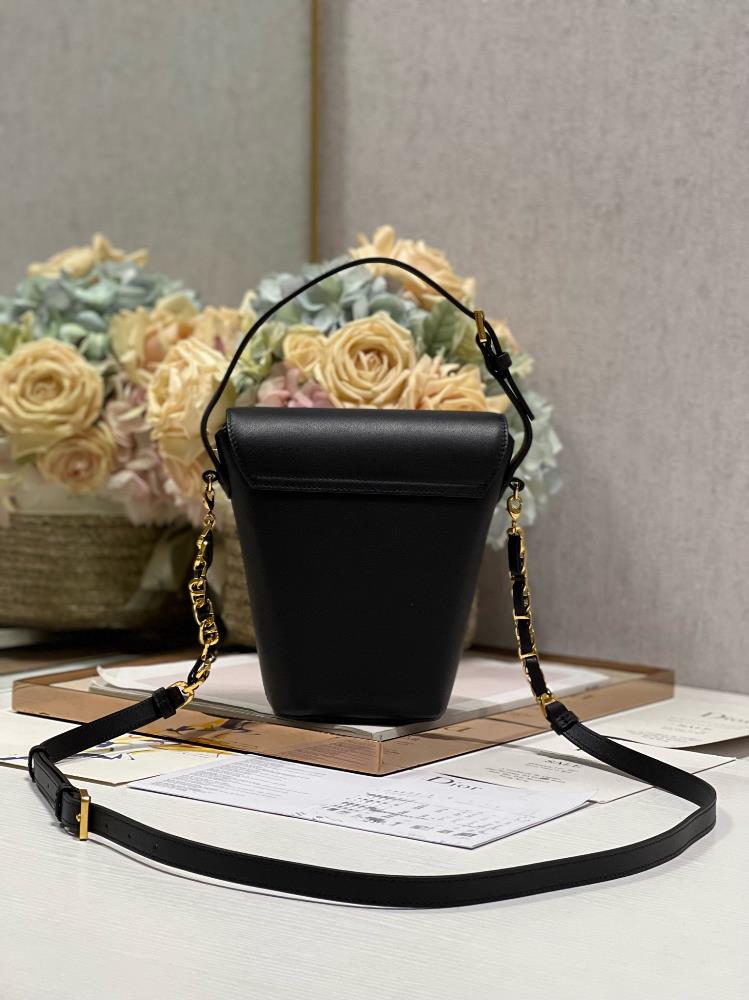 In terms of functionality the Montaigne Mini Chain Bucket Bag doesnt disappoint It has