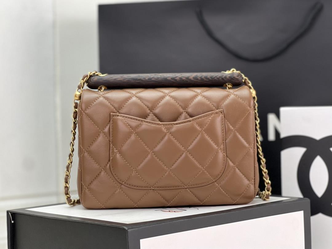 The Chanel 23A Advanced Handicraft Shop series features a new wooden handle flap bag inspi