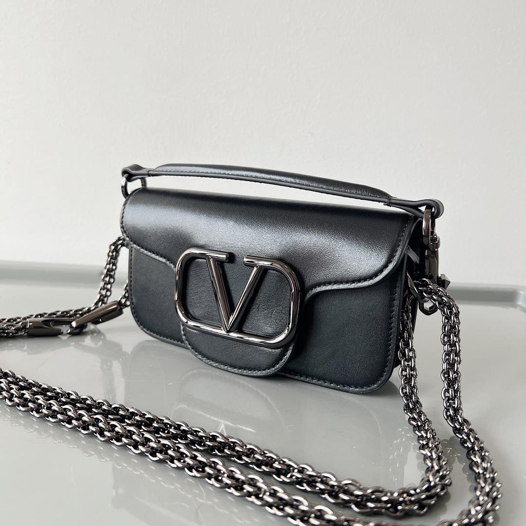 Garavani MINI LOC calfskin handbag with metal VLogo Signature detailsEquipped with detacha