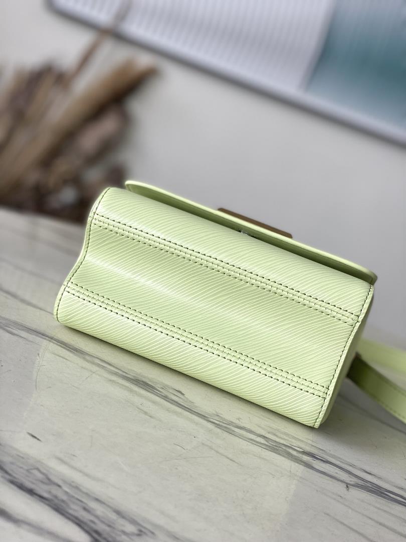 M22768 Apple GreenThis Twist small handbag incorporates the brands iconic Monogram flower