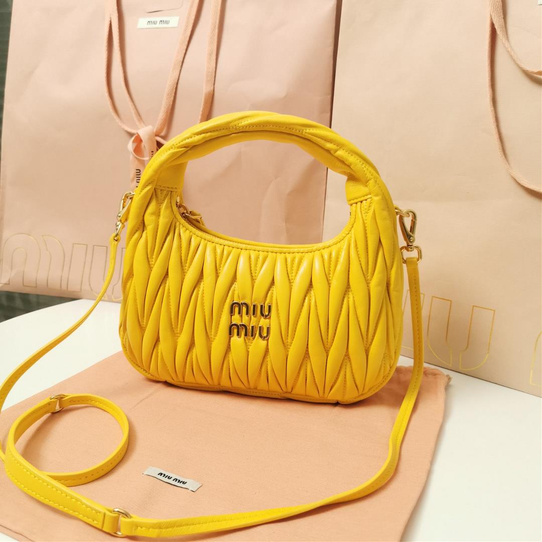 Medium The MiuWander handbag a new product from M family features the iconic Matelasse texture embro