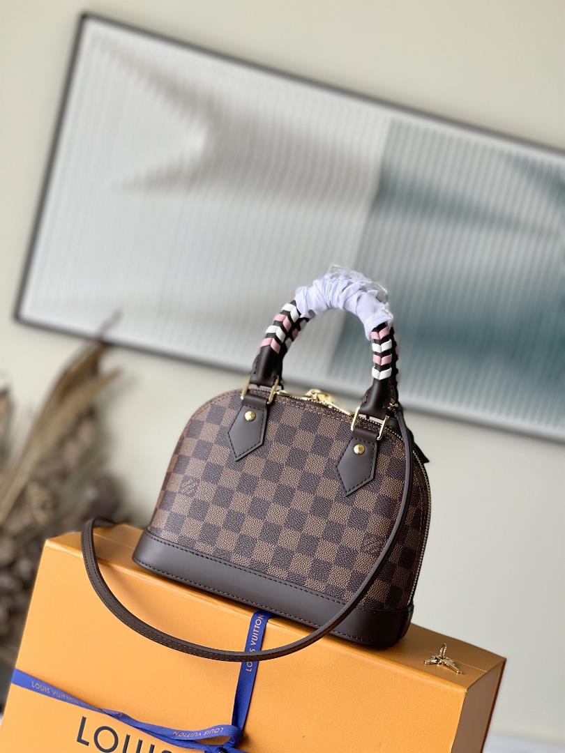 N4044741221 brown plaid weaveThis Alma BB handbag has taken on a new look this season reinterp