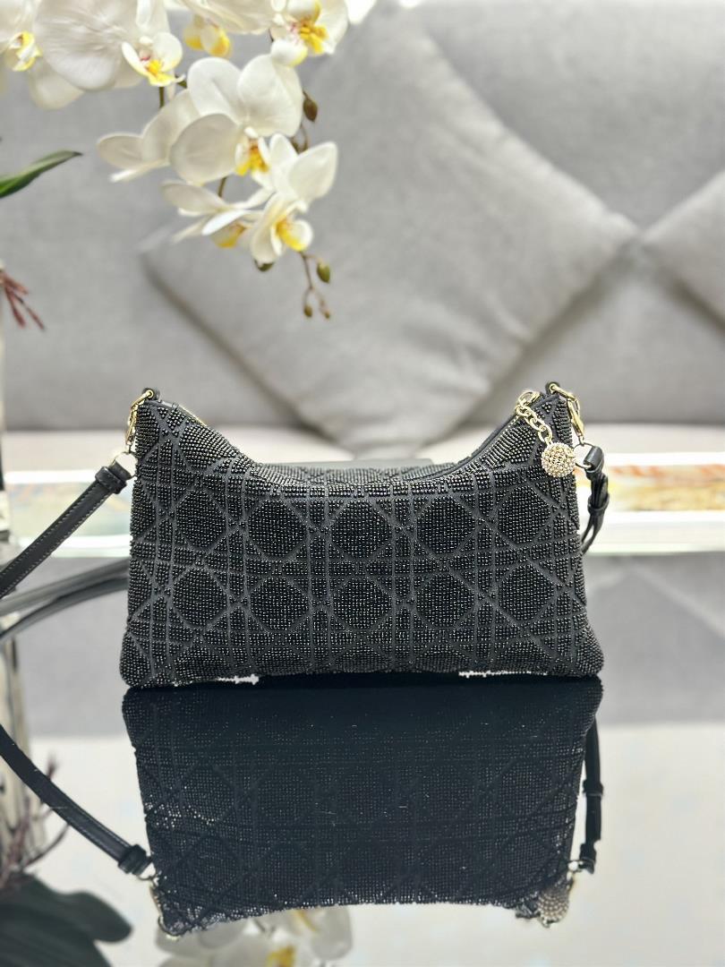 Dior Dreams embroidered beaded tube is black and in the summer of 2023 a unique and exquisite 