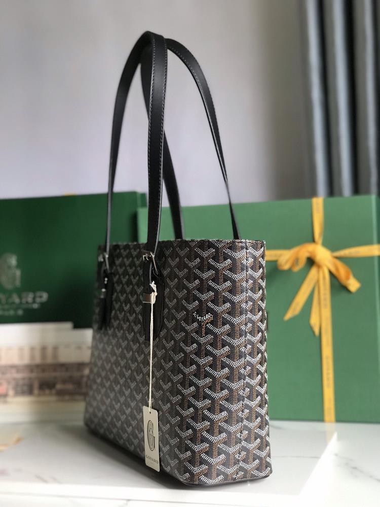 The Goyard bag a timeless symbol of elegance and sophistication is a vintage bag that ex