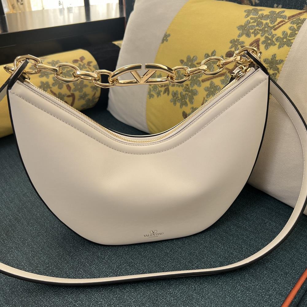 What I love most about the Valentino bag 2080B is its ability to make a statement without