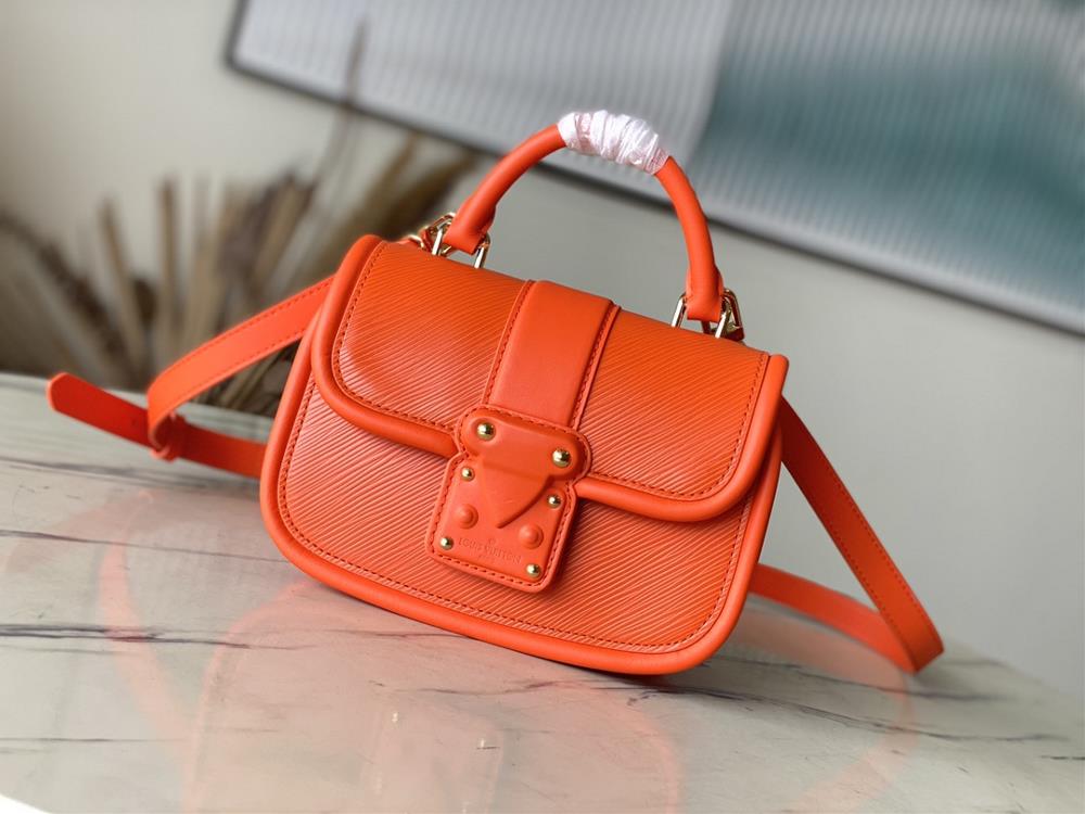 M22723 Orange This Hide Seek handbag features Epi leather accents in bright tones featuring a Toron roller handle and leather wrapped lock buckle tr