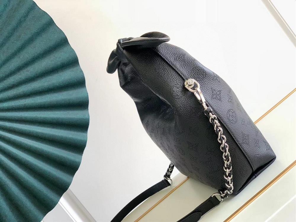 The LV Bag M20700 also known as the Why Knot small handbag is more than just a fashion