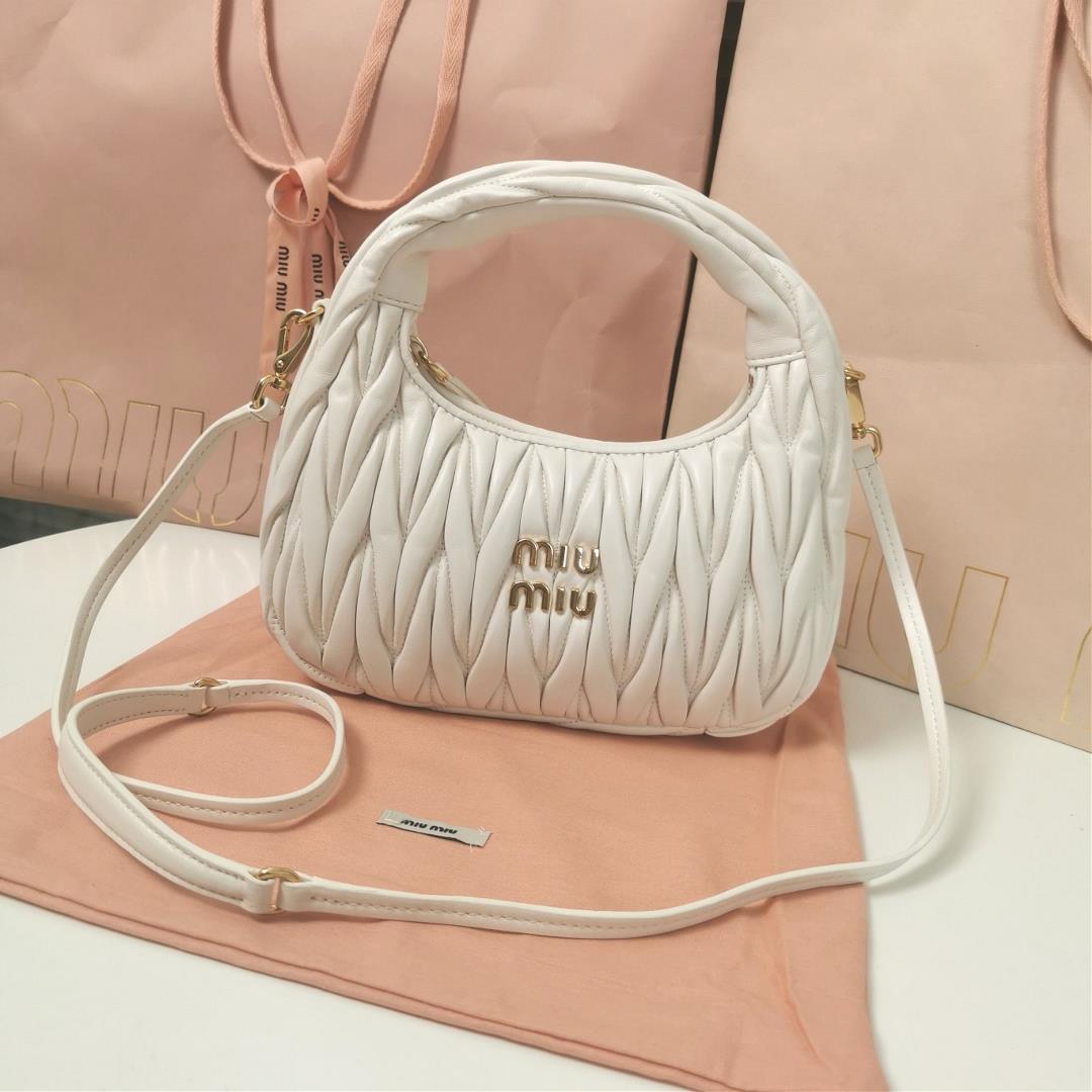 Medium The MiuWander handbag a new product from M family features the iconic Matelasse texture embro