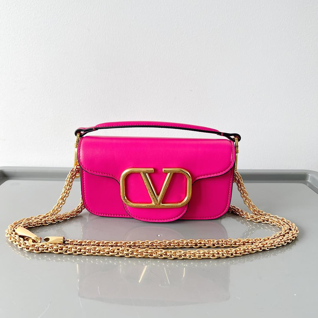 ValtinoGaravani MINI LOC calfskin handbag with metal VLogo Signature detailsEquipped with