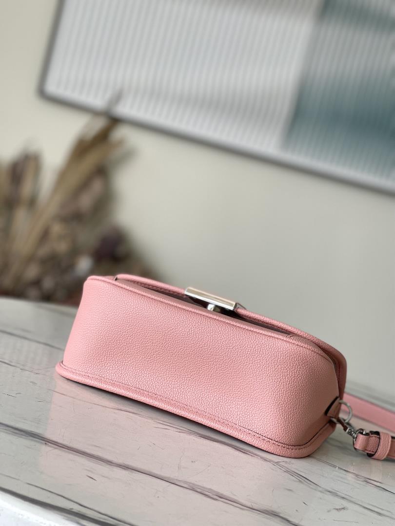 M2098759386 Peach Powder is a Buci crossbody bag made from iconic grain grain Epi leather This