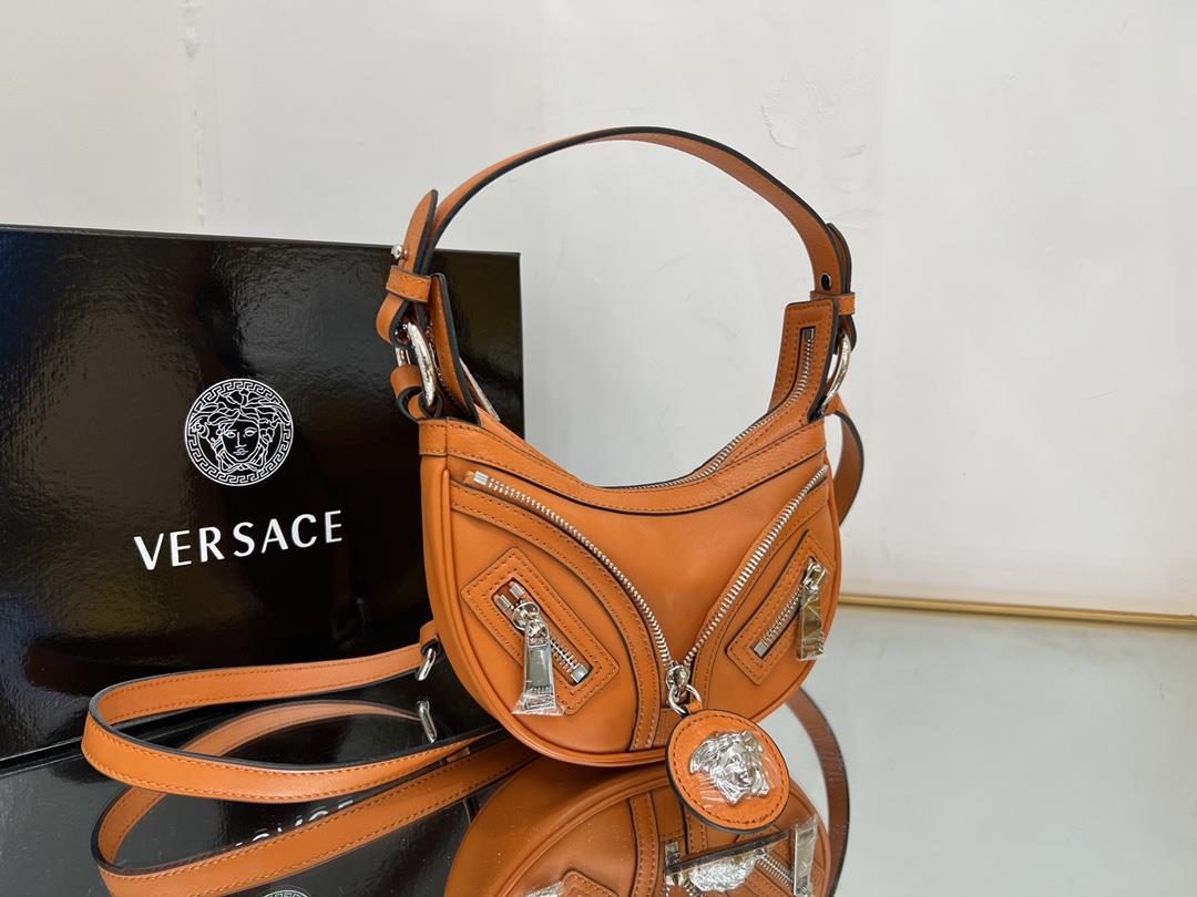 Small Medusa Versace new crescent bag which can be worn across the body or under the arm