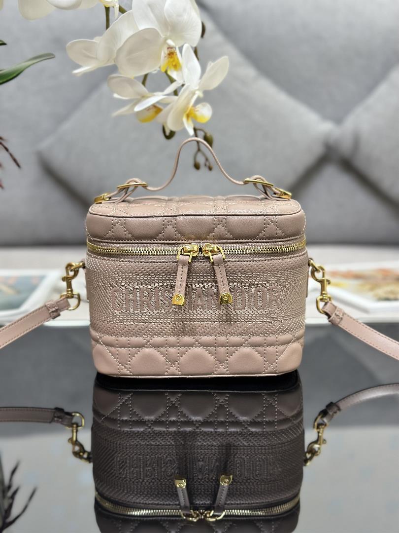 The ribbed Dior Travel handbag in the makeup bag showcases this seasons style Carefully crafte