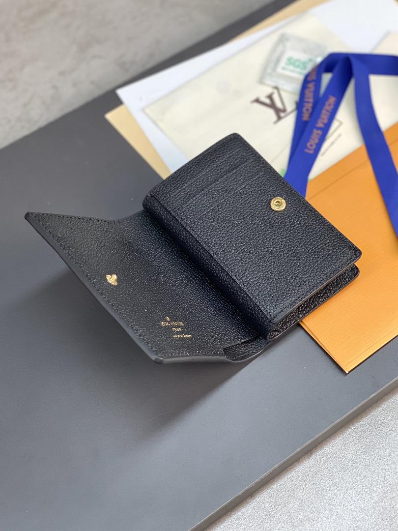 The M80512 black embossed Cla wallet is made of Monogram Imprente soft grain cowhide and f