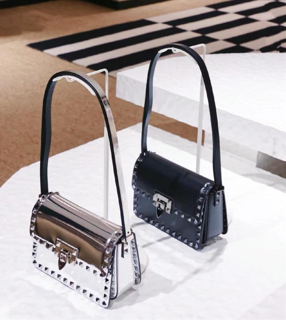 VALENTINOGARAVAI Valentino Garavani Rockstud23 calf leather handbag with enamel rivet trim