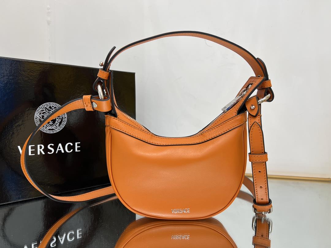 Small Medusa Versace new crescent bag which can be worn across the body or under the arm