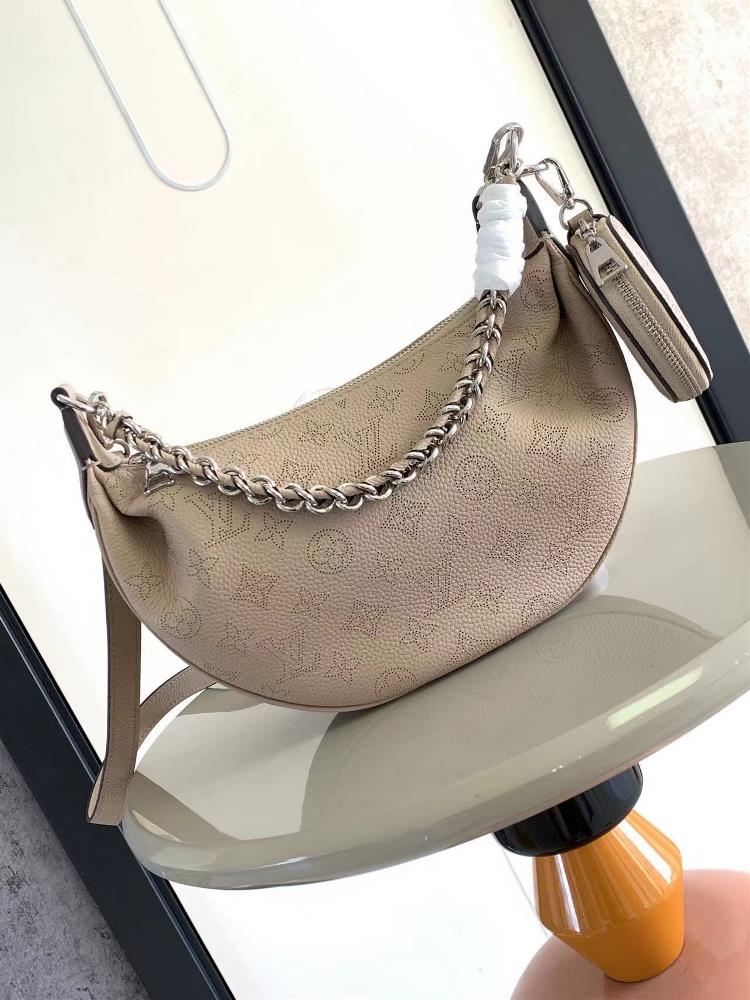 Baia Moon Small Handbag M22820 22959 PunchedMade of soft and pendulous perforated cowhide leather it is added to the Mahina series with a comfortable