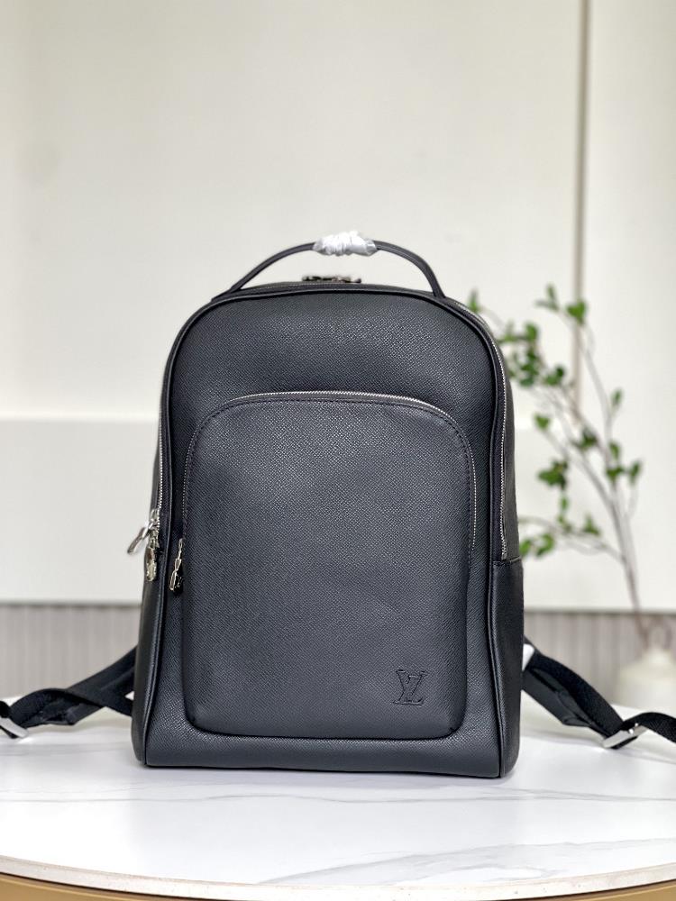 The toplevel original M30977 Cross Pattern Avenue backpack features Taiga leather with cowhide trim and metal pieces blending practical functionalit