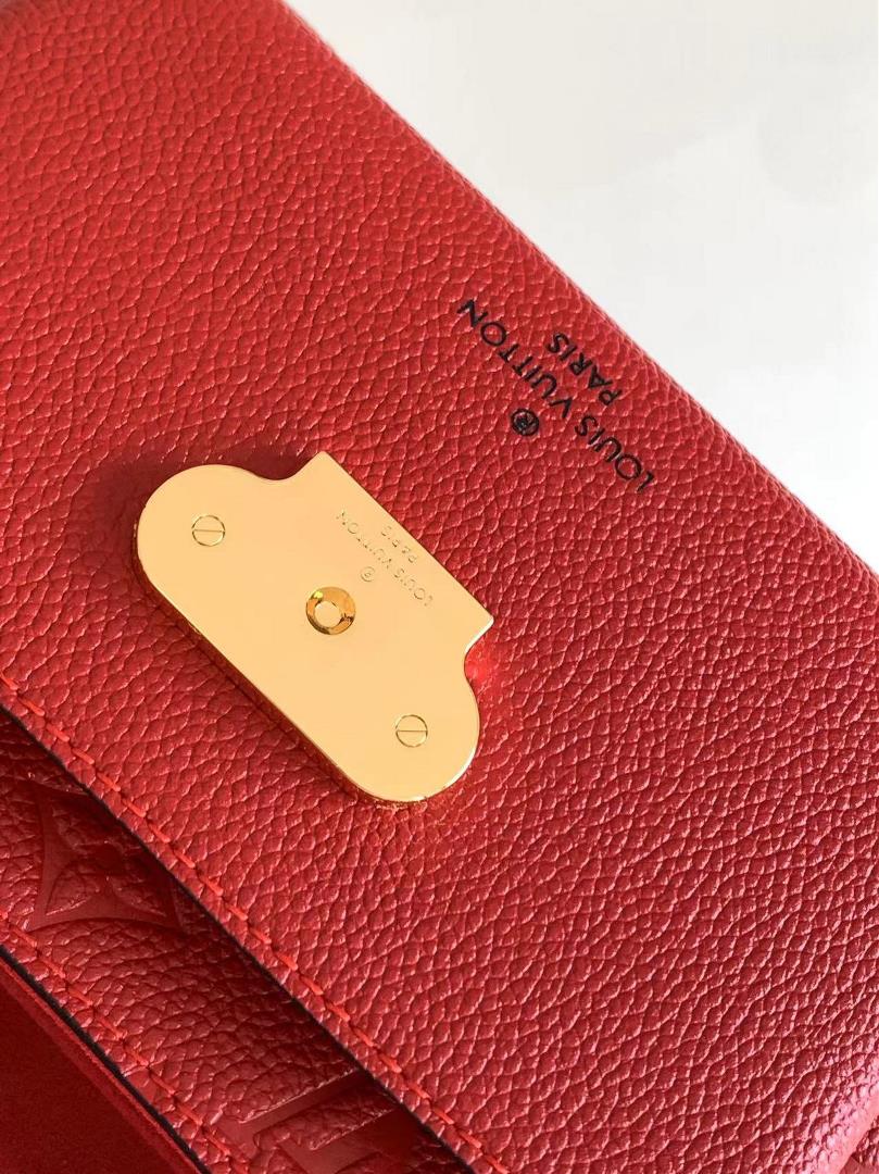 M44550The smooth and embossed Monogram Imprente combines silky and textured texture with