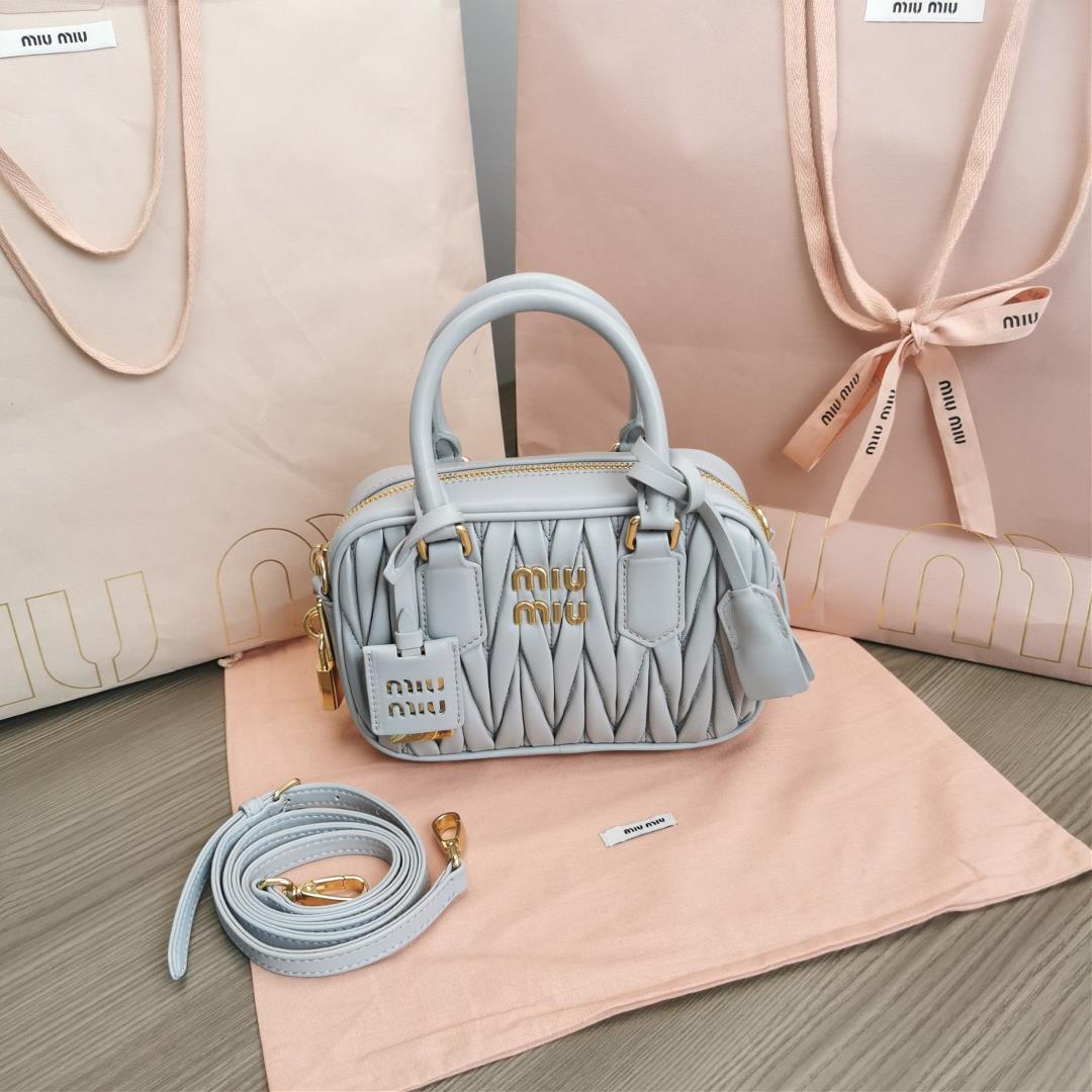 Medium The M familys new product Too Pretty Bowling Handbag features imported lamb skin classic bran