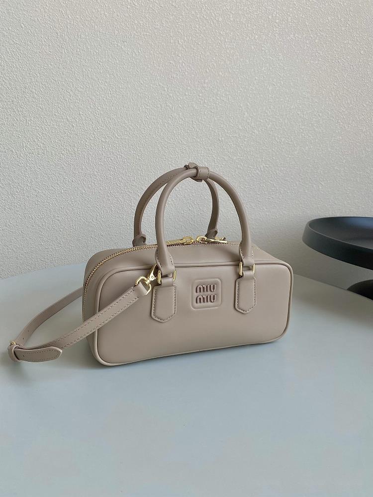 The Miumiu Bowling bag in Milk Tea color has taken the fashion world by storm and its ea