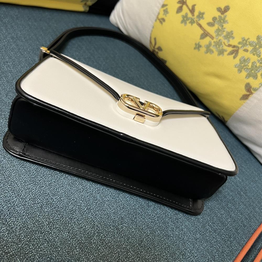 The Valentino Bag with its sleek lines and luxurious materials exudes a timeless charm t