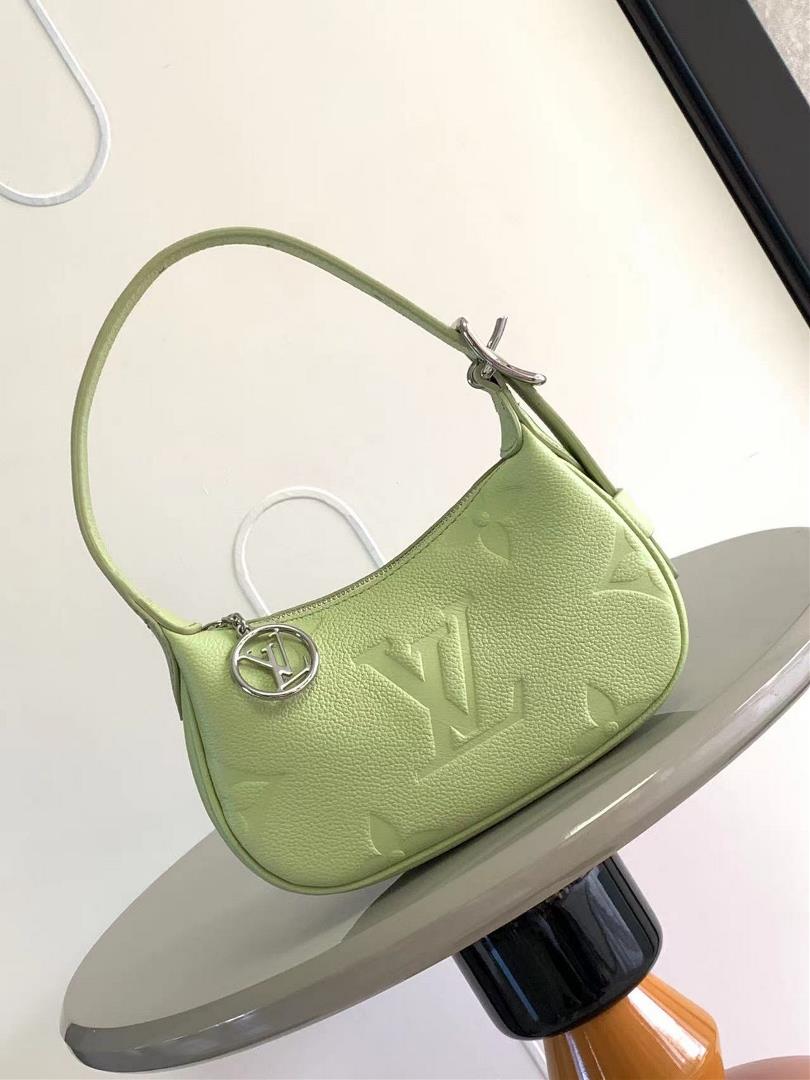 The M82391 M82519 Mini Moon handbag is made of soft Monogram Imprente embossed leather allowing eye