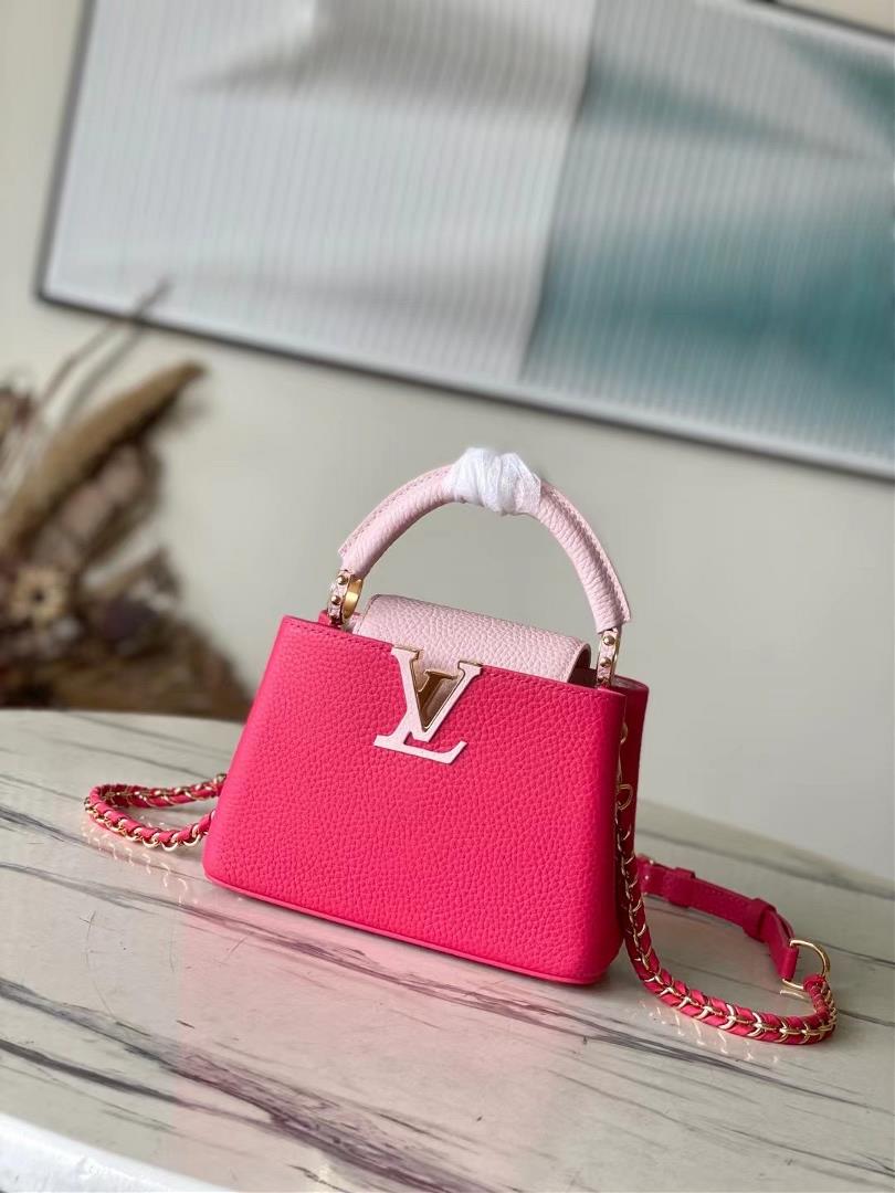 The topnotch original M21689 pink mini this Taurilon leather version of the Capuchines mini handbag