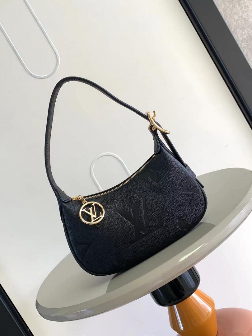 The M82391 M82519 Mini Moon handbag is made of soft Monogram Imprente embossed leather allowing eye