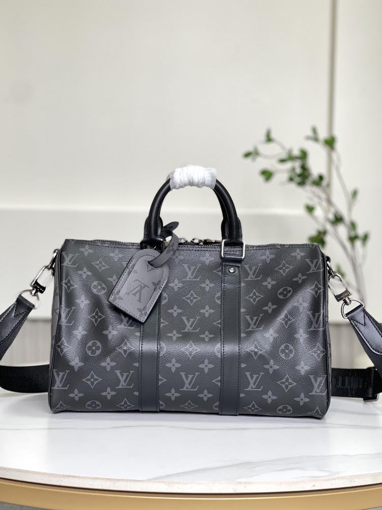 M46655 Black FlowerThis Keepall Bandoulire 35 handbag uses Monogram Eclipse coated canvas to convey introverted style Leather top handle side strap