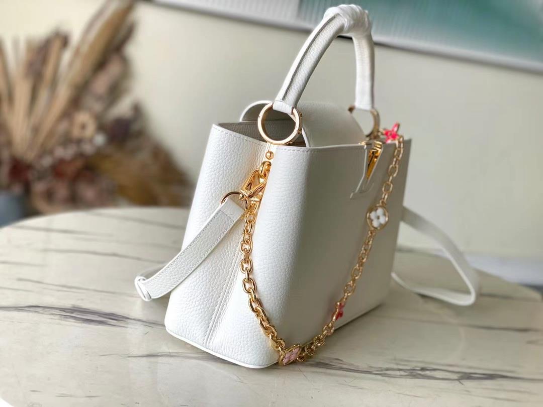 The top quality original M22512 white Capuchines medium size handbag showcases the new seasons