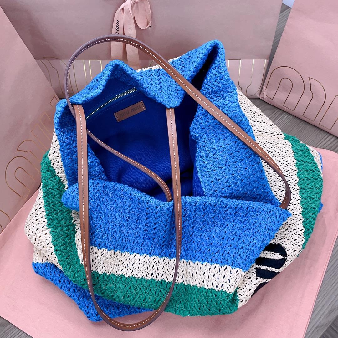 The M familys new imported Lafite grass woven cotton thread woven tote bag has the only matchi