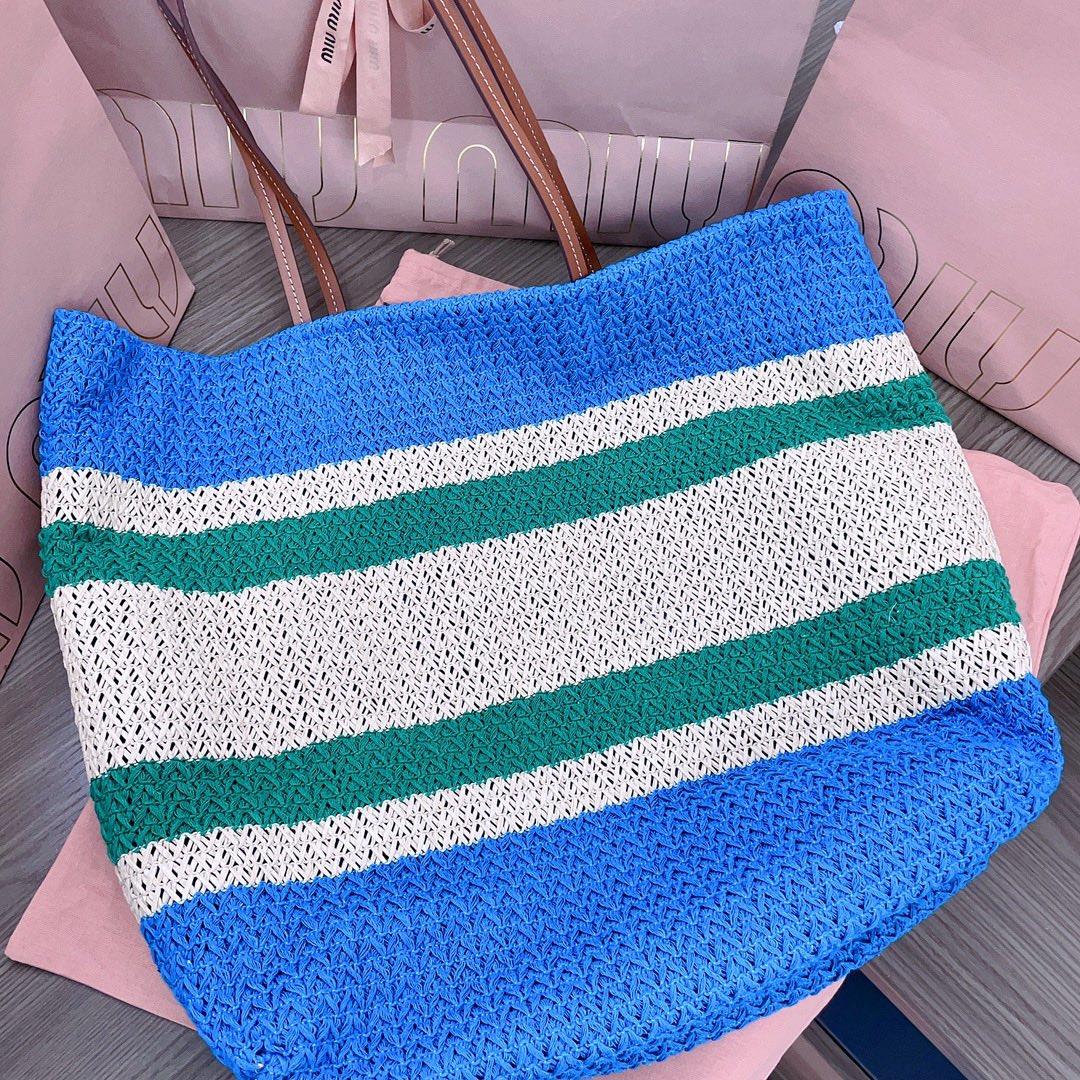 The M familys new imported Lafite grass woven cotton thread woven tote bag has the only matchi