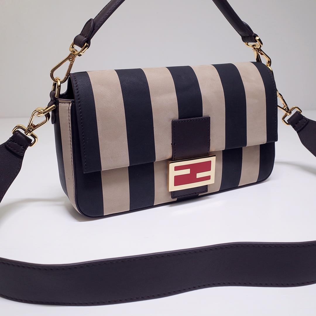 The FEND1 iconic Baguette Medium handbag features a flip design and FF magnetic buckle The lin