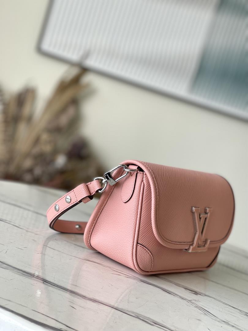 M2098759386 Peach Powder is a Buci crossbody bag made from iconic grain grain Epi leather This