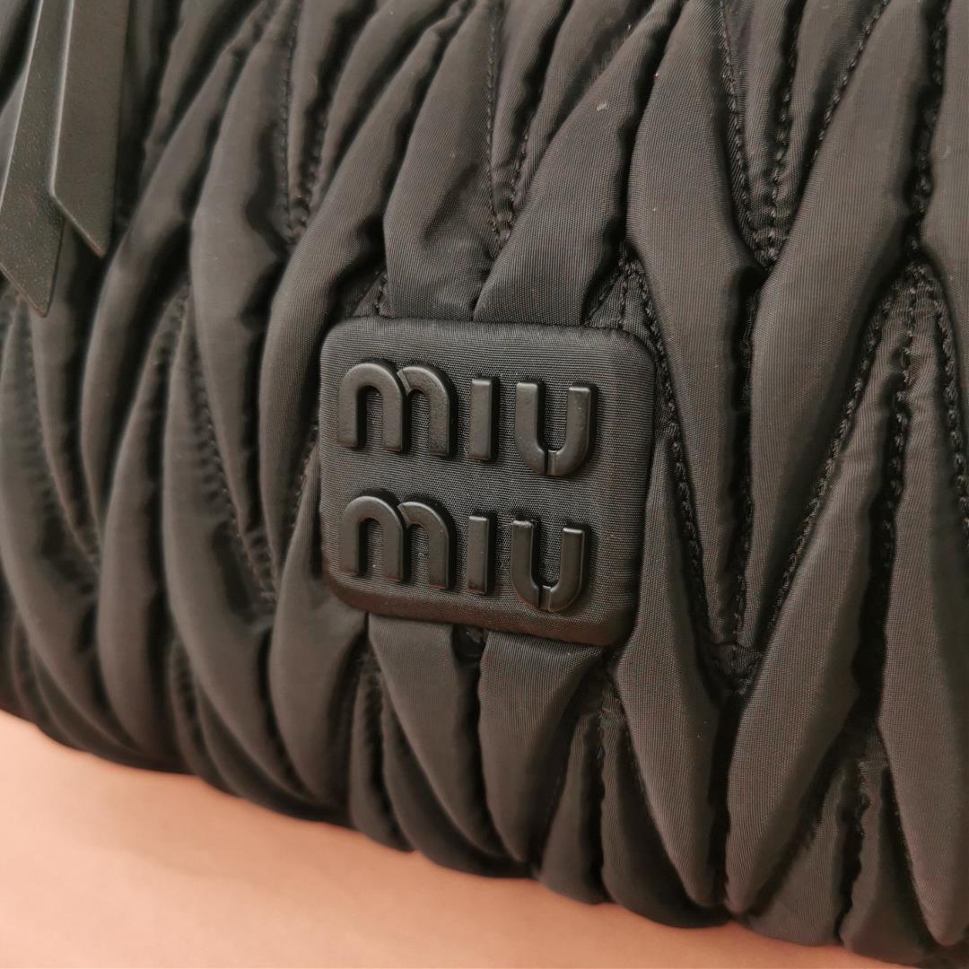 MiuWander handbag a new product of M family is made of environmentfriendly nylon The yarn is m