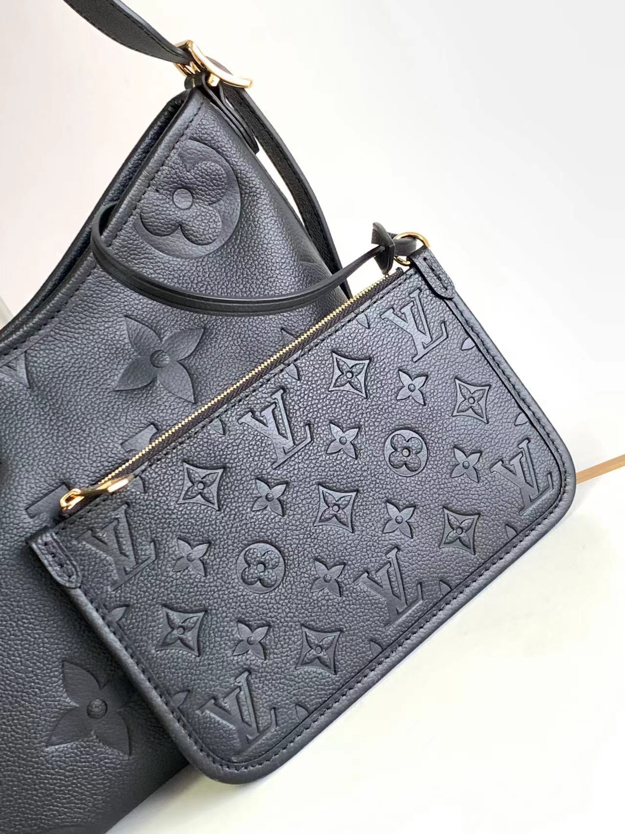 M46288 M46203 matching details CarryAll small size handbag is made of Monogram Imprente emboss